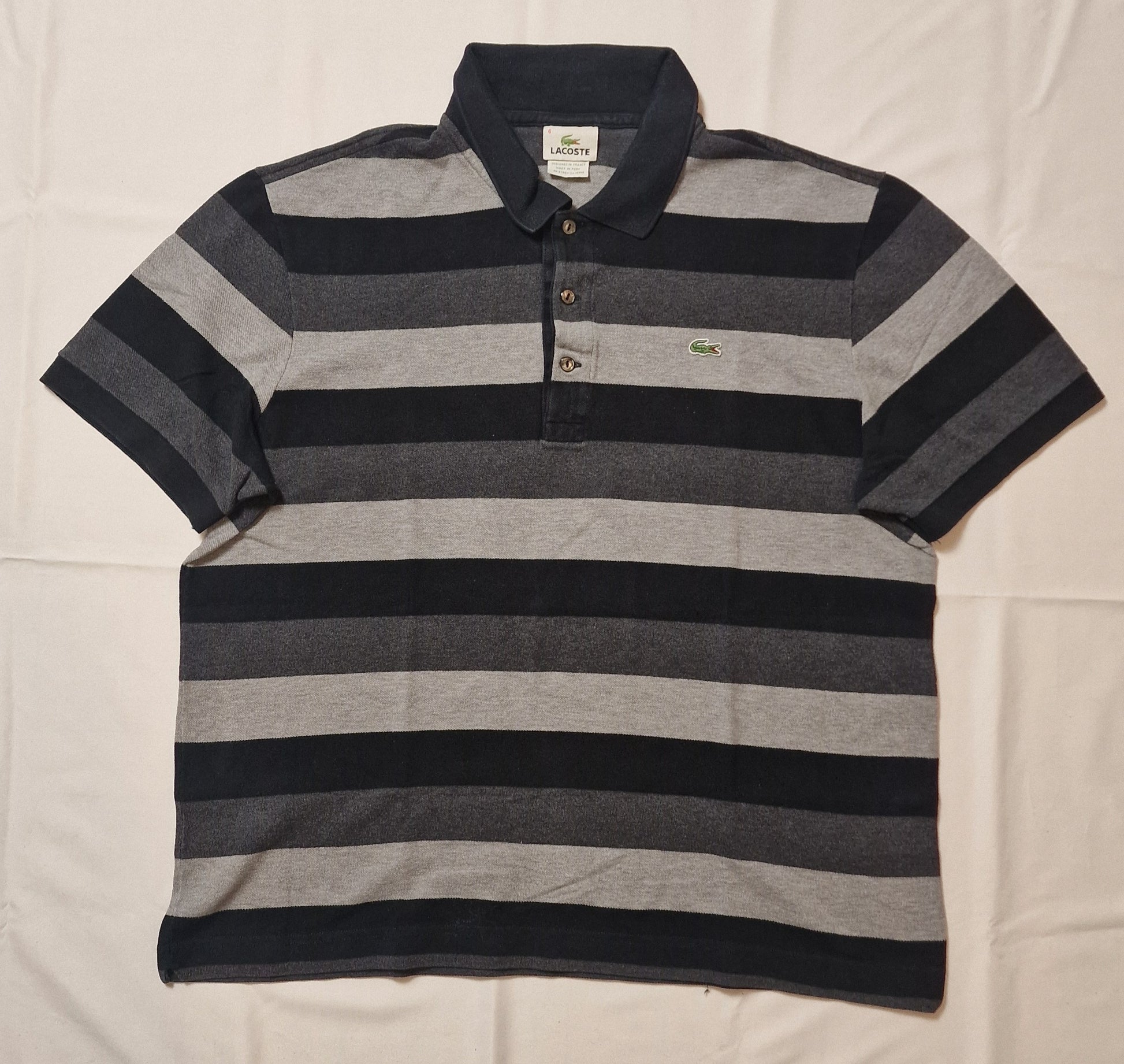 POLO LACOSTE 6/XL GRIS NOIR RAYÉ