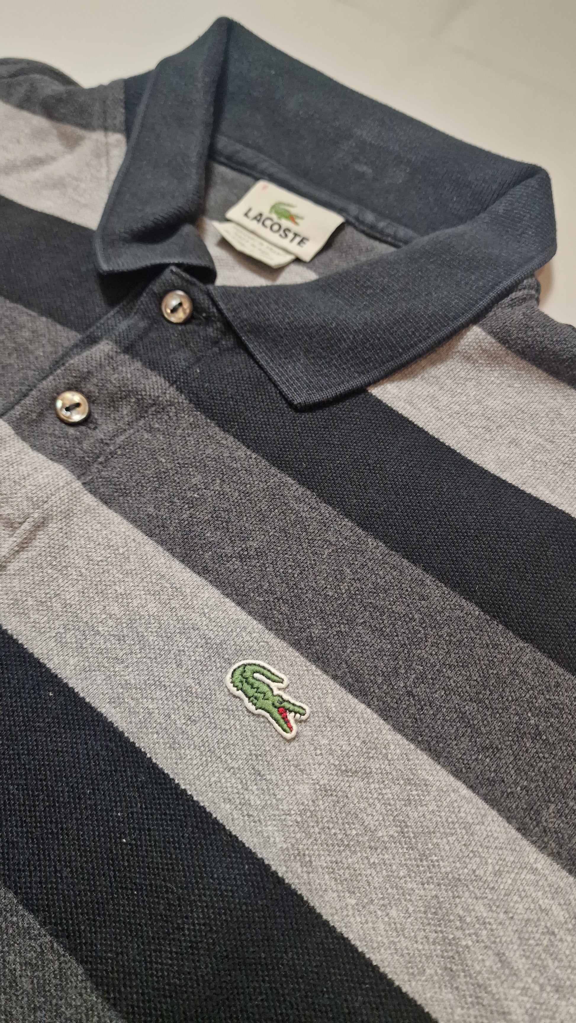 POLO LACOSTE 6/XL GRIS NOIR RAYÉ